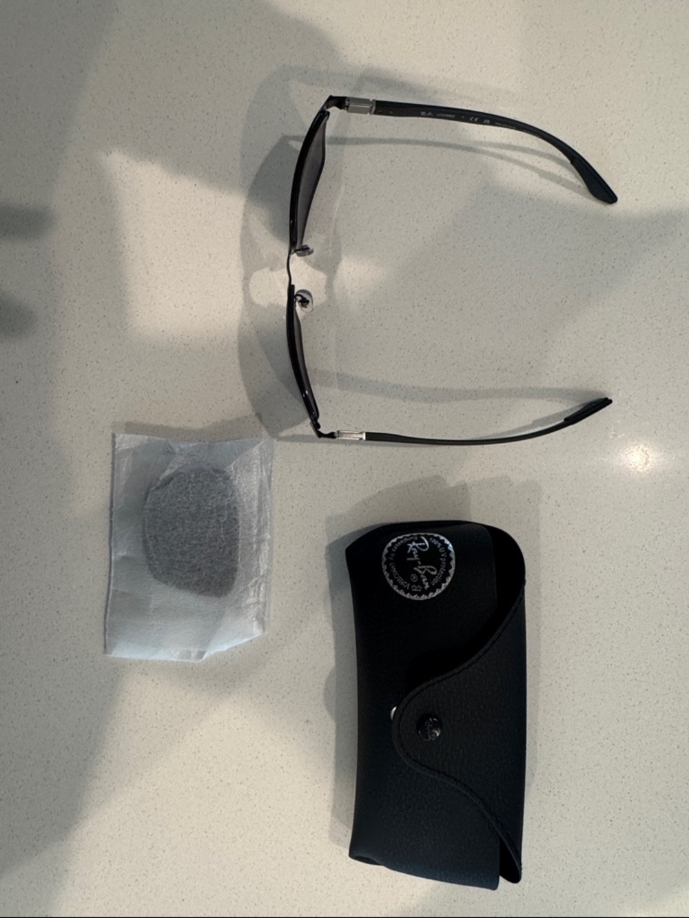 Ray-Ban RB3721CH sunglasses with two sets of polarized lens.